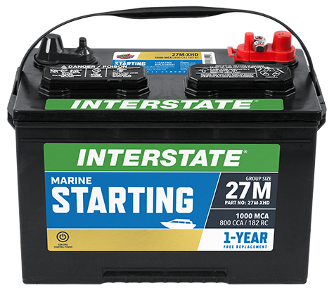 Interstate Marine Starting Battery with red and black terminals, green and yellow branding, and product information printed on the side.