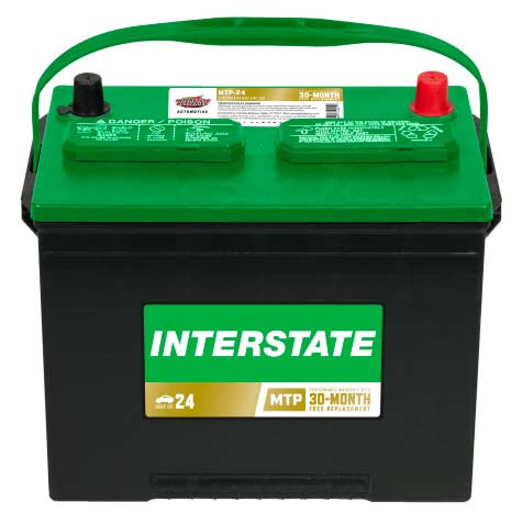 Car battery, green top black case.  Interstate label