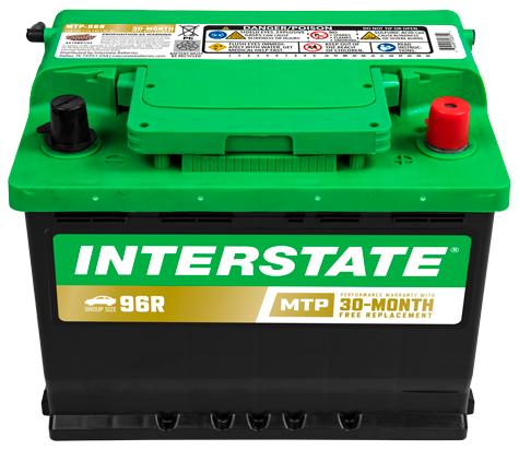 Car battery with green top and black case.  Recessed terminals, Interstate labels.